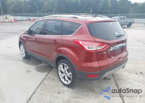 2014 Ford Escape Titanium z USA, uszkodzony, nr VIN 1FMCU0J9XEUA89585